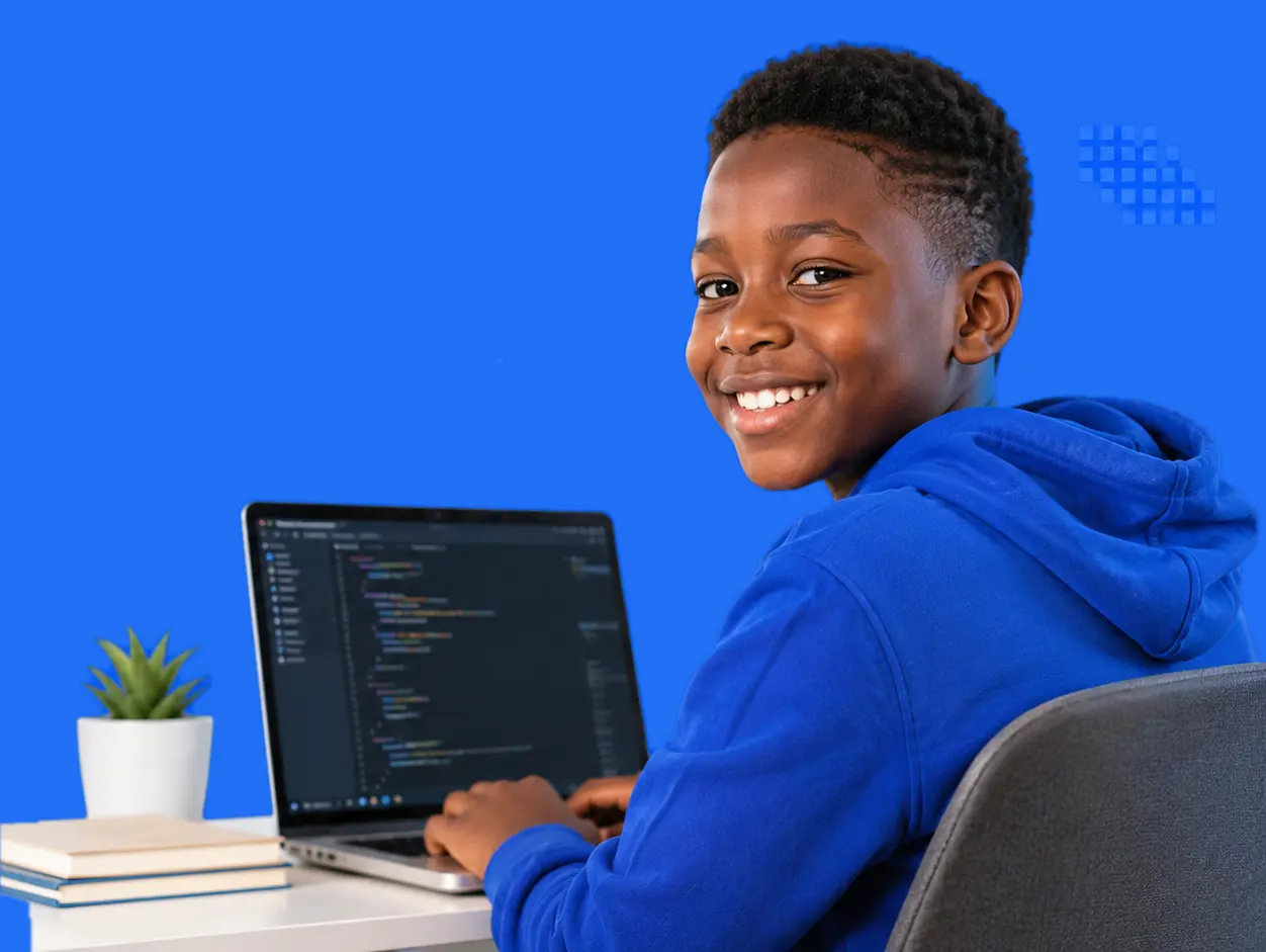 A boy engaging in online coding classes for kids